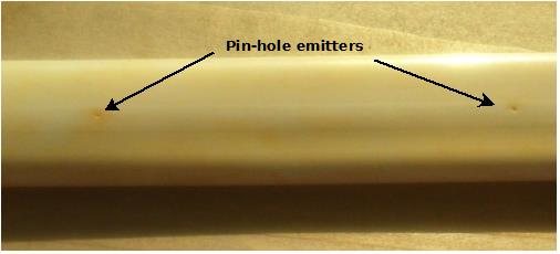 soaker drip hose showing pin holes